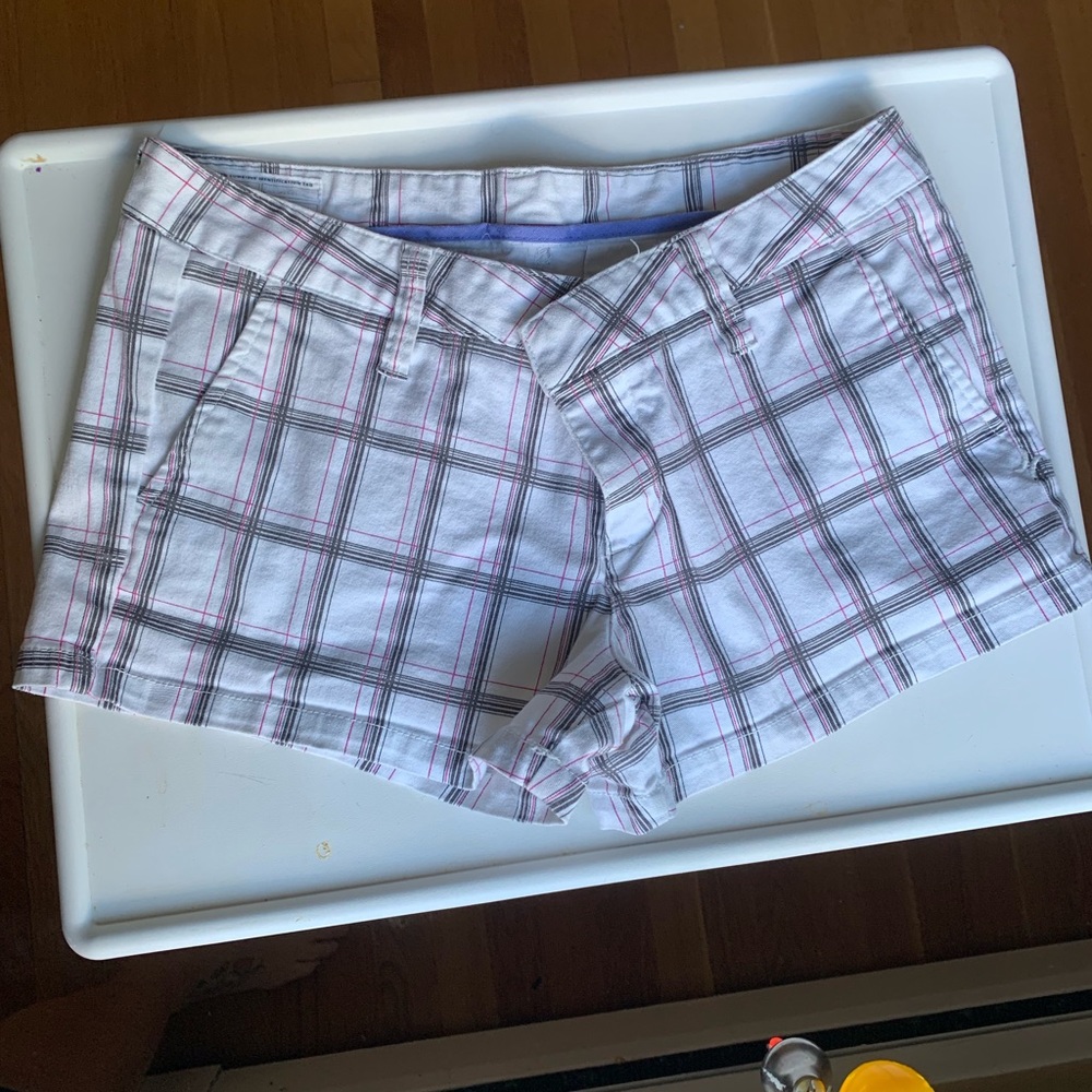 Hurley’s white shorts with black & pink plaid